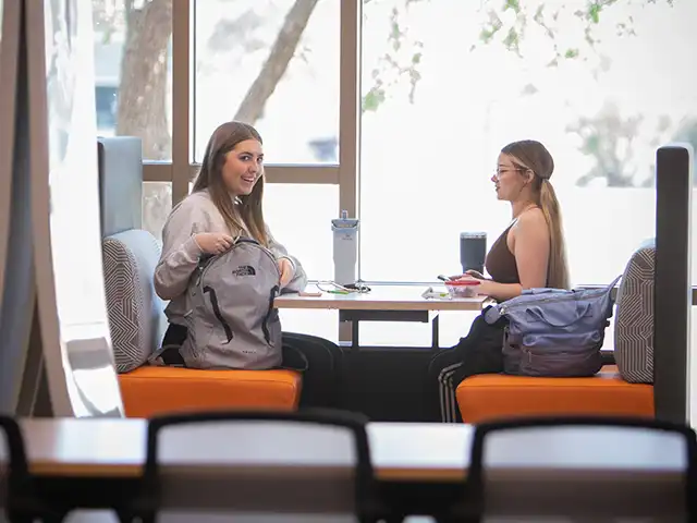 2 students in the library