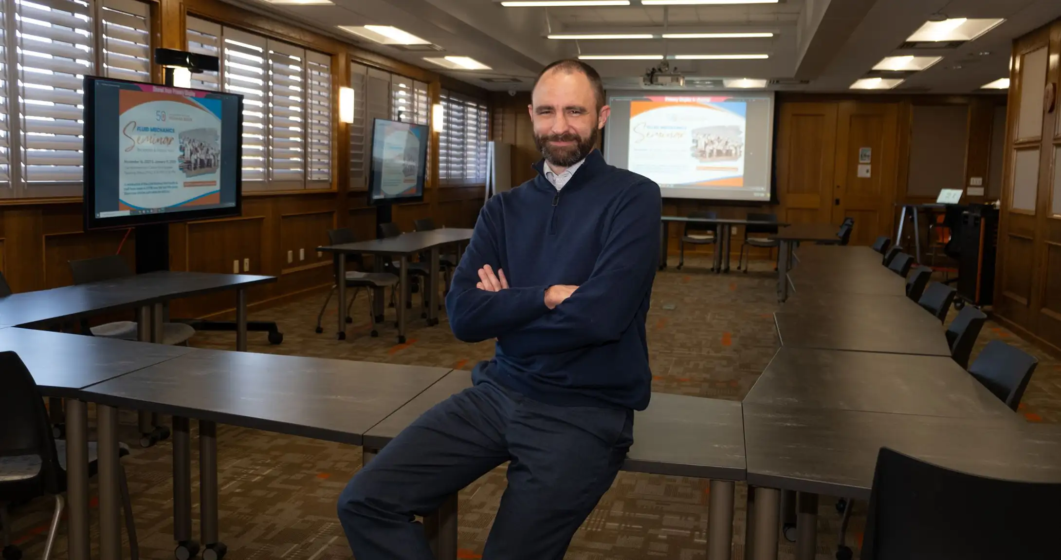 Clark Moreland sitting in the Heimmermann Center
