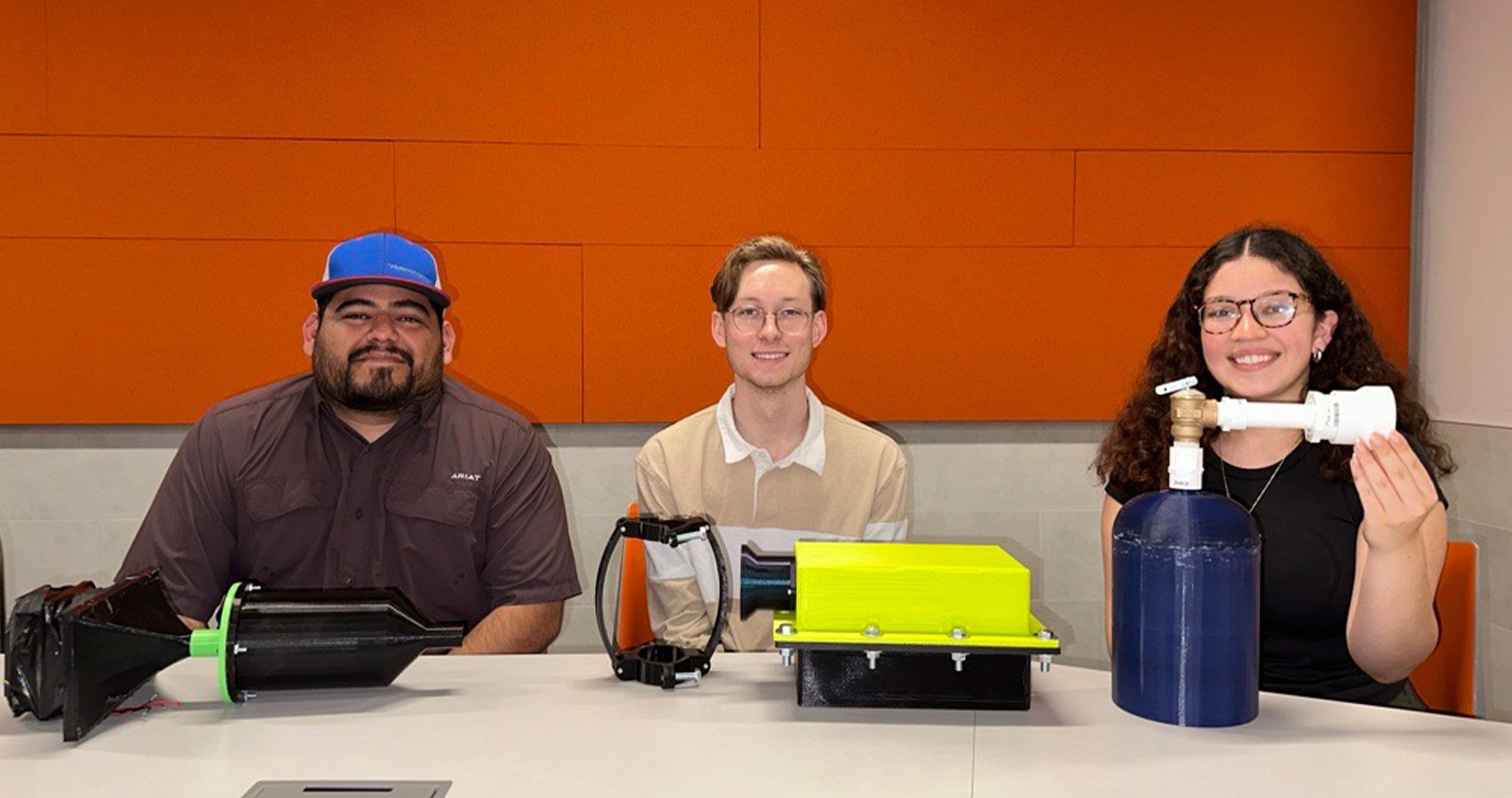 engineering students pose with final project