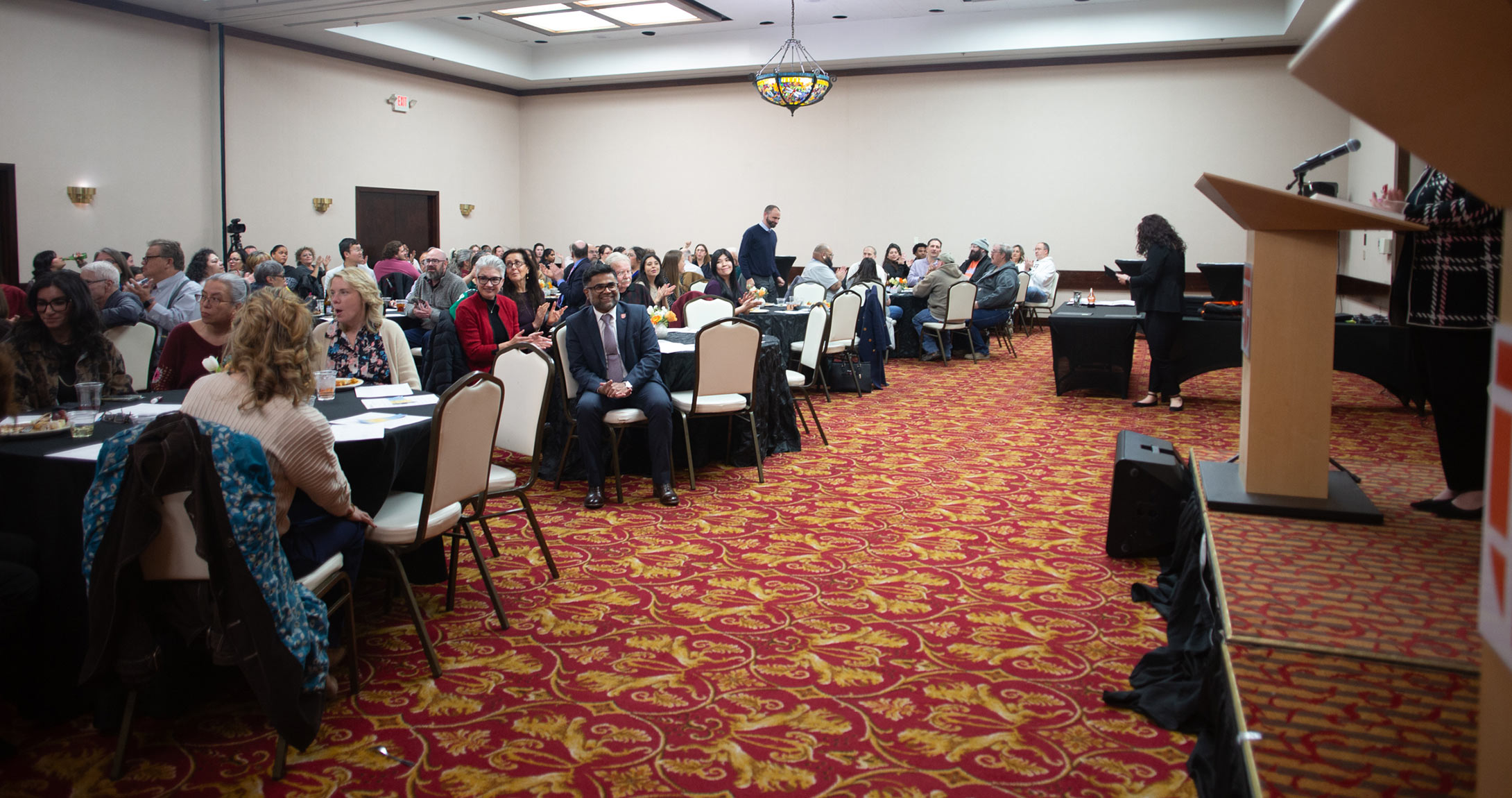 UTPB faculty and staff sitting at tables at award ceremony