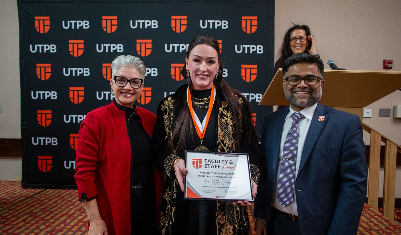 President's Teaching Award winner with president and provost