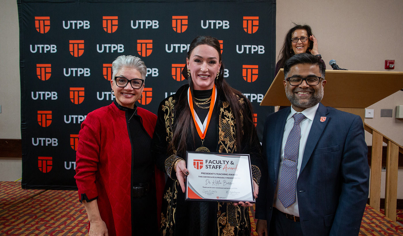 President's Teaching Award winner with president and provost