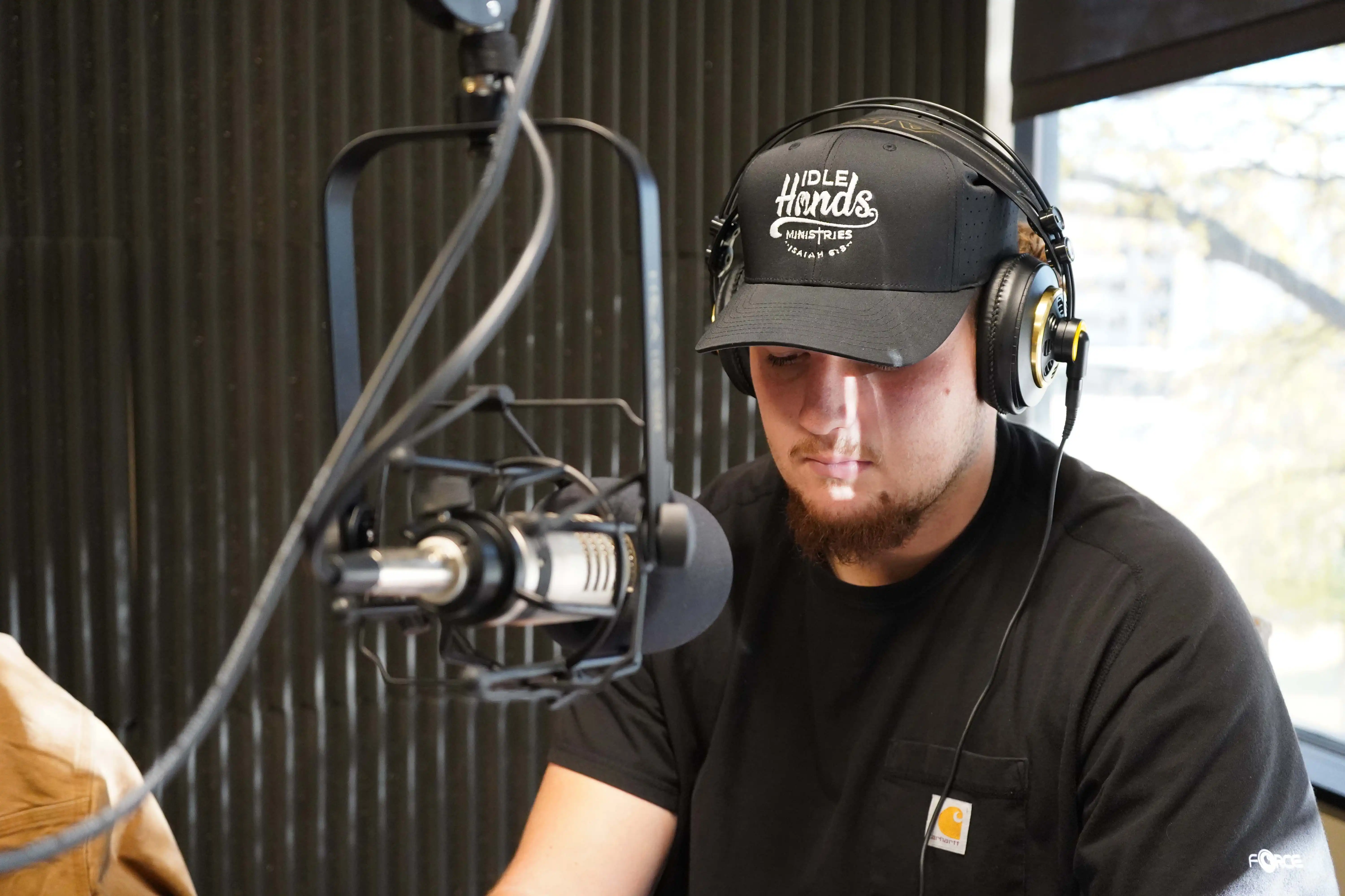 UTPB student recording an audiobook at the Recording Library of West Texas.