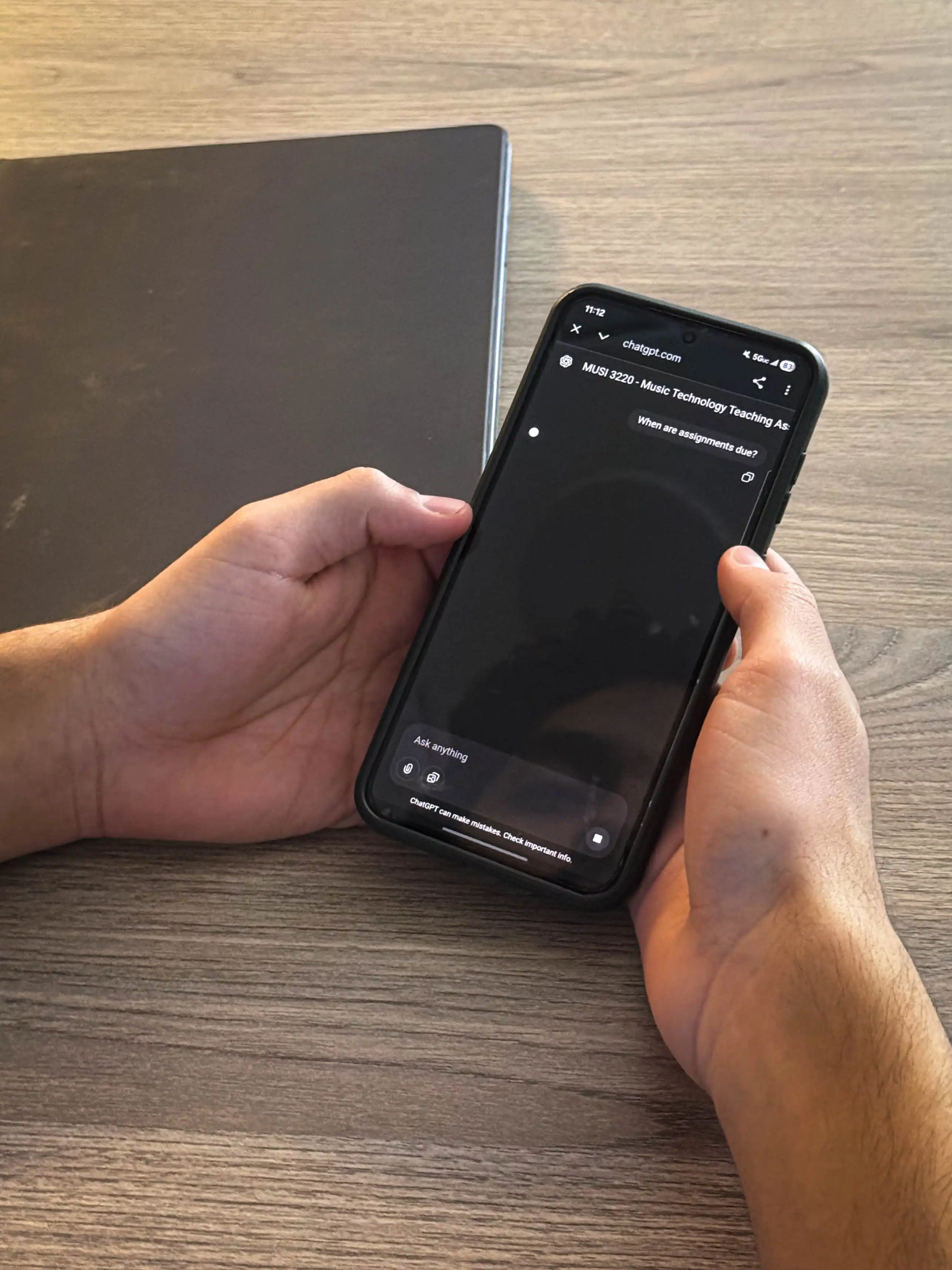 UTPB student utilizing the AI teaching assistant on their phone. 