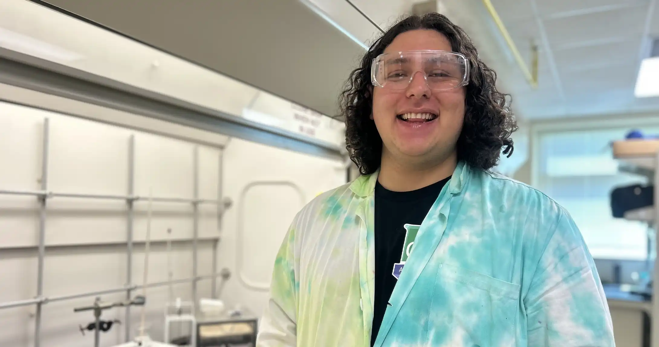 Ethan Yager standing in the lab where he conducts research. 