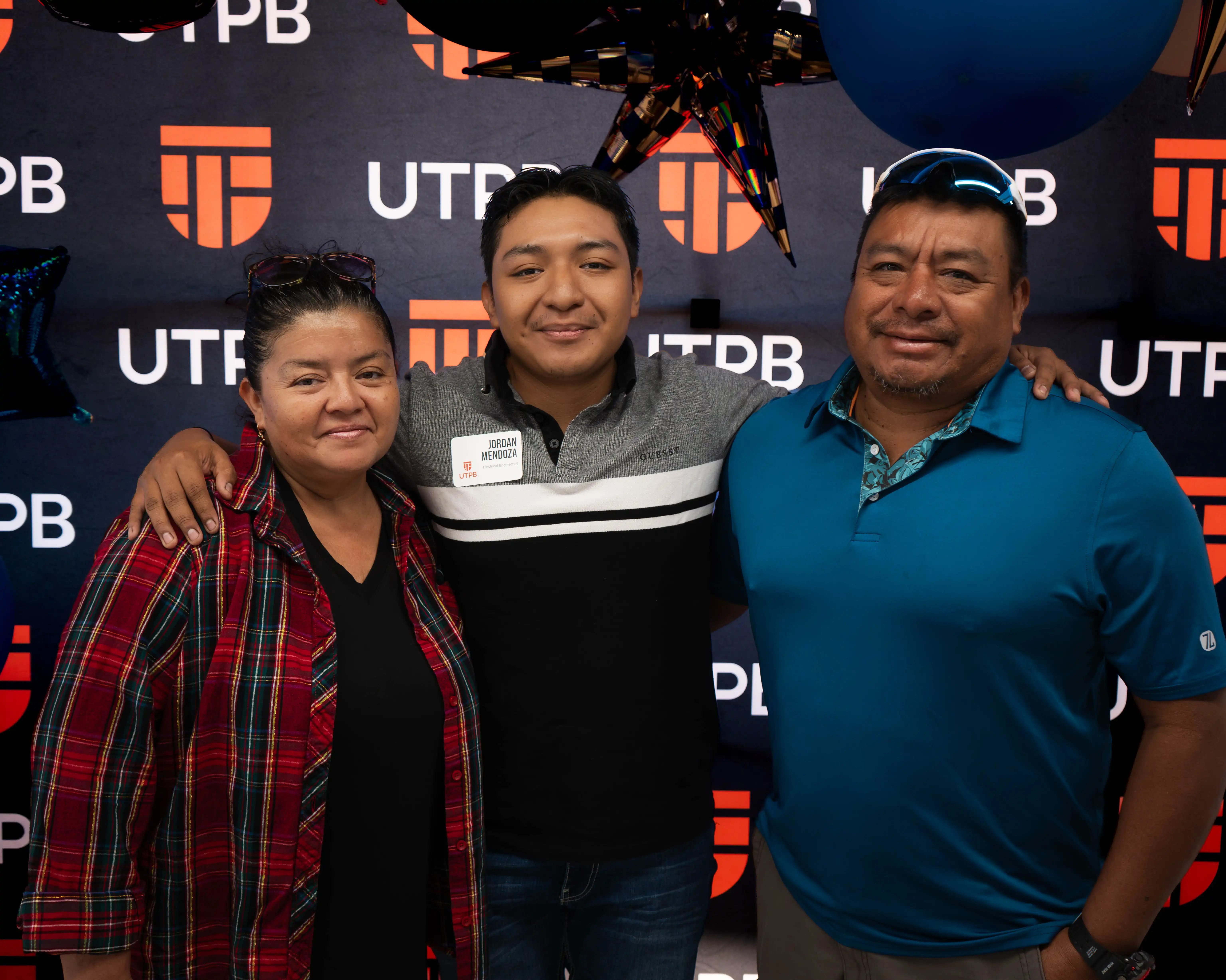 Jordan with his family at the López Scholar luncheon before the semester began.