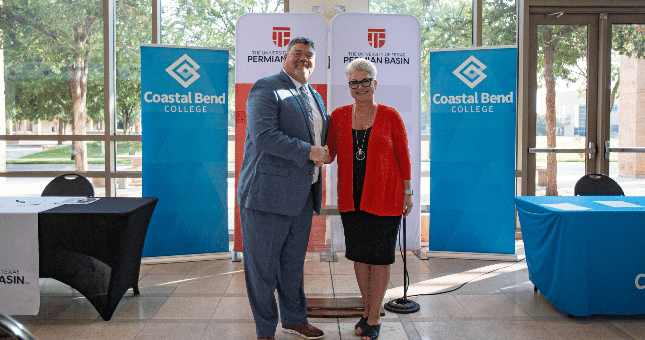 UTPB President and Coastal Bend President Smile for a Photo
