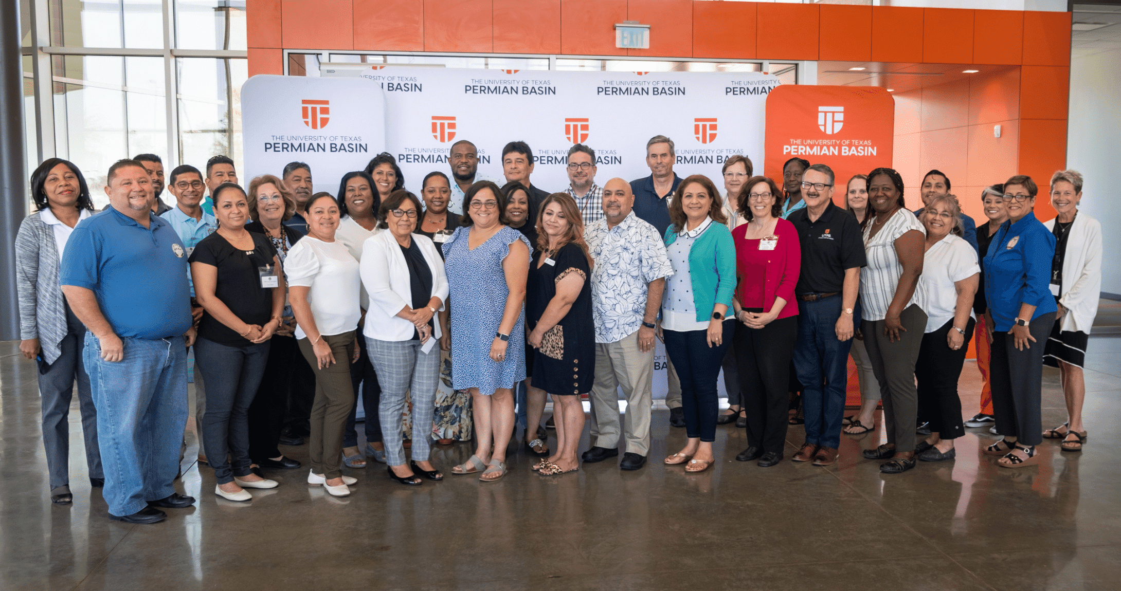 Group of faculty smiling at camera