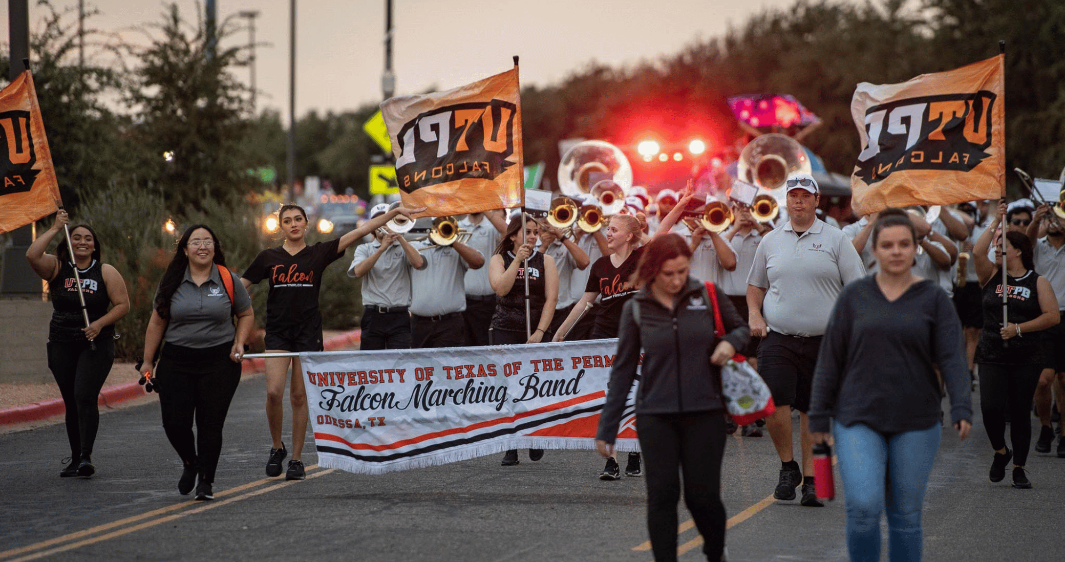 students marching a parade