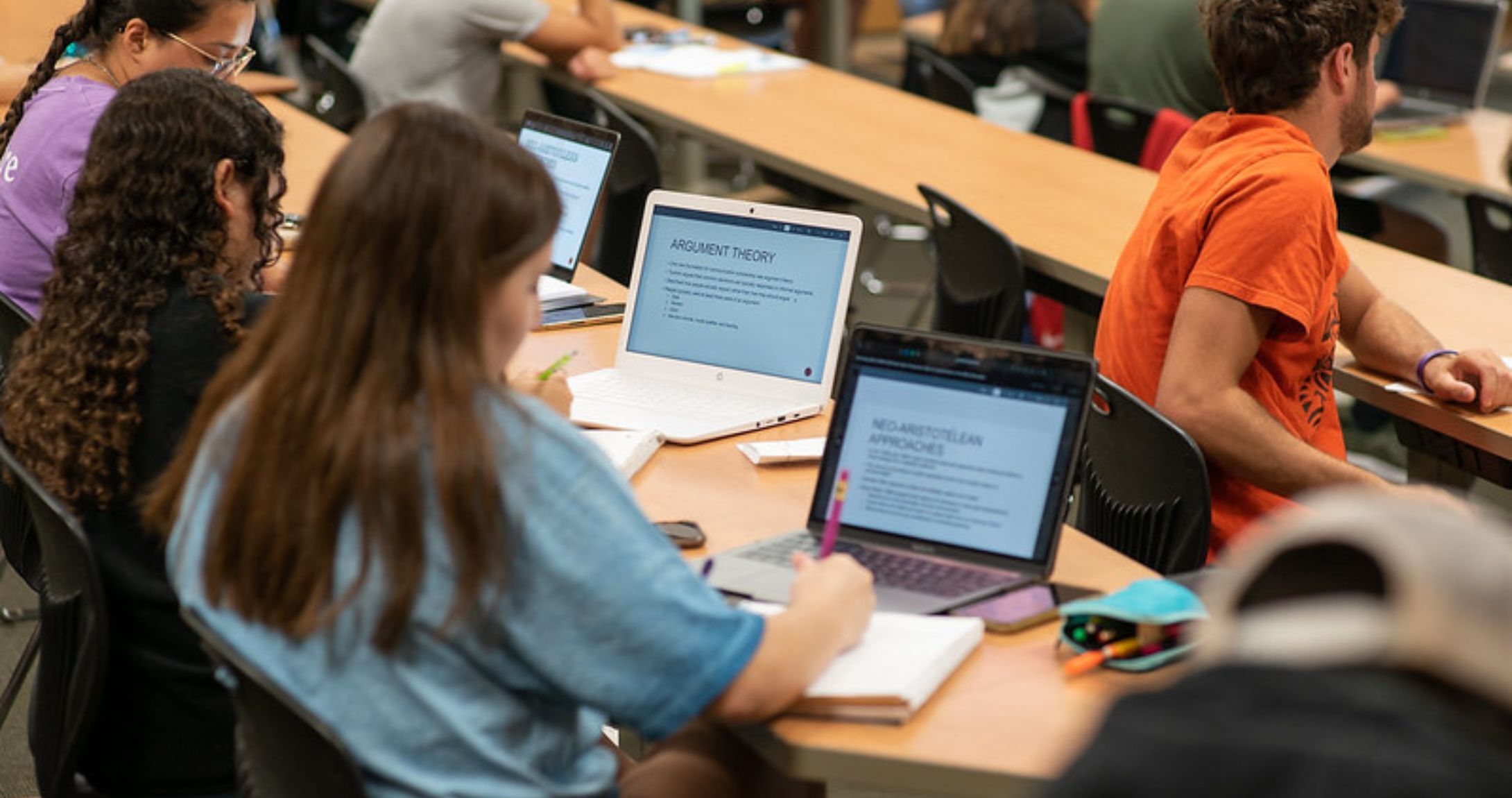 students typing on computers