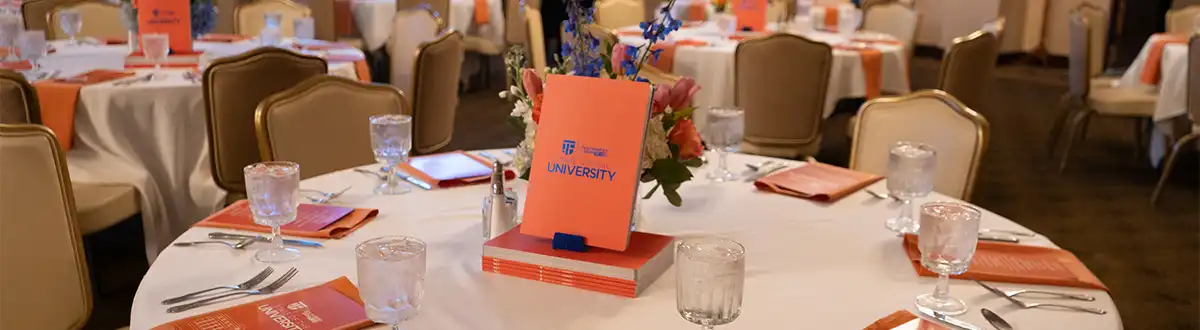 State of the University table set up from 2024